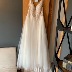 Brand new with tag wedding dress! Sweetheart brand